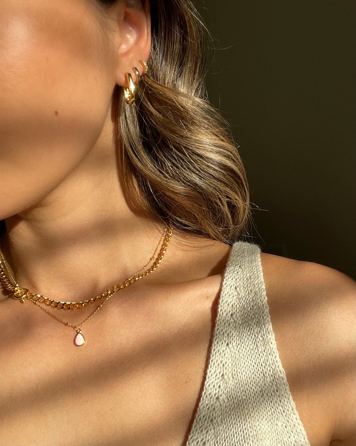 Modeled 18k gold plated necklaces at sunset with Esme and Erin cuban chain