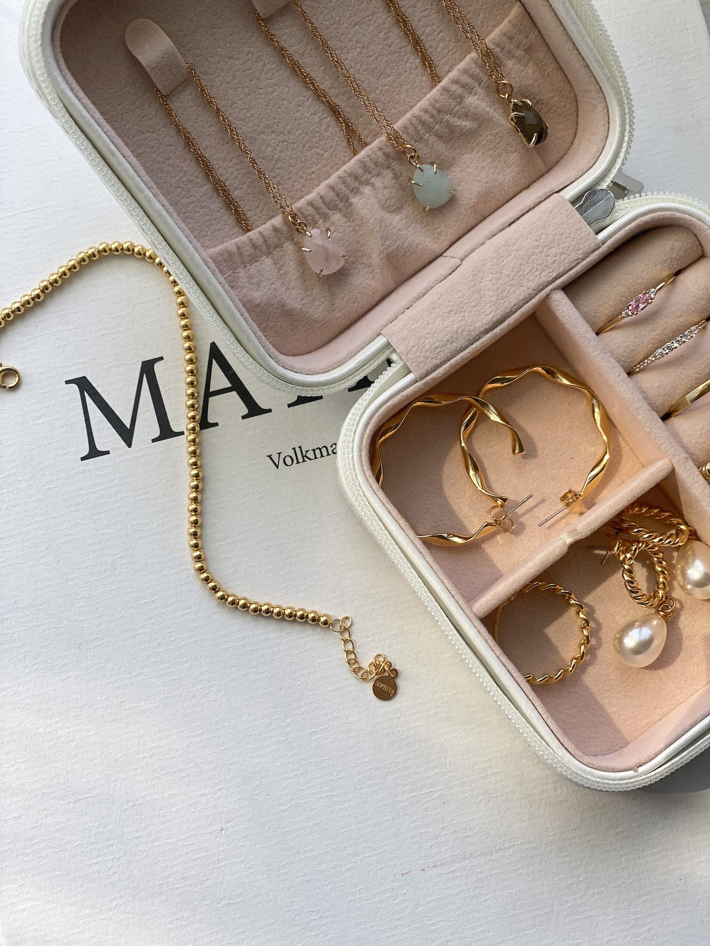Pendants, hoops, rings and rings fll sophiya light pink jewelry box.