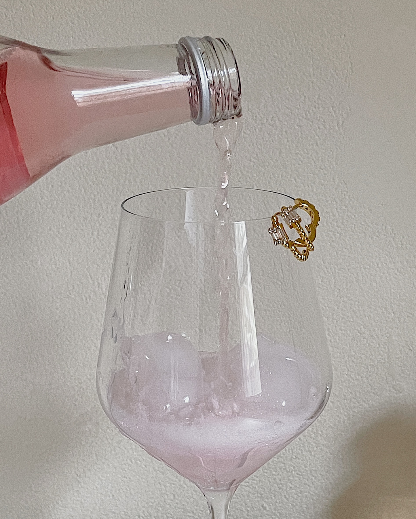 Camille Huggie Earrings with CZ featuring pink summer mocktail
