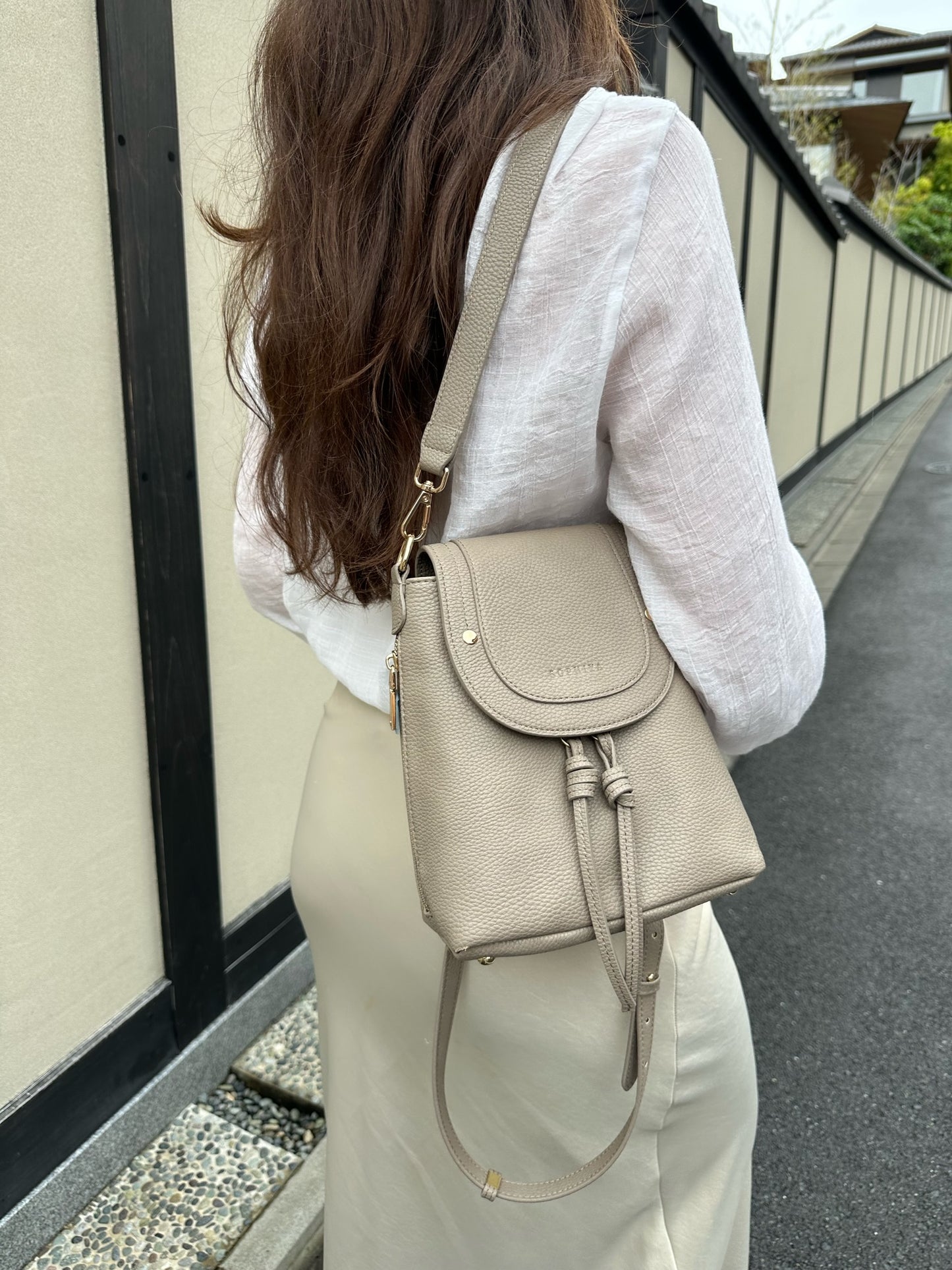 SOPHIYA taupe gray small backpack modeled as shoulder bag