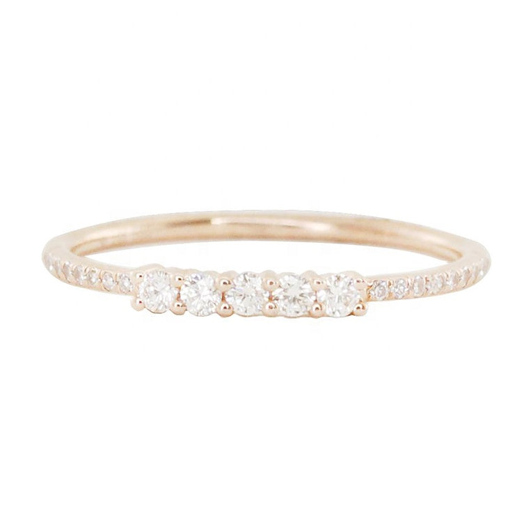 Detailed shot of white rose gold finished for Lily ring with cubic zirconia gemstones pave row stack ring 