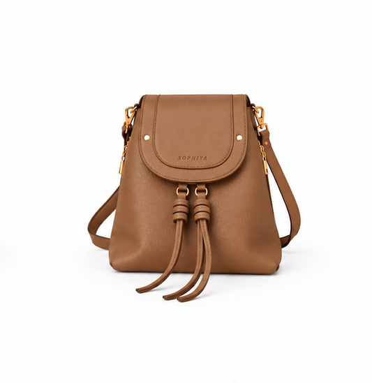 A brown leather crossbody bag with a front flap, gold-tone hardware, and leather tassel details on the front, shown against a plain white background.