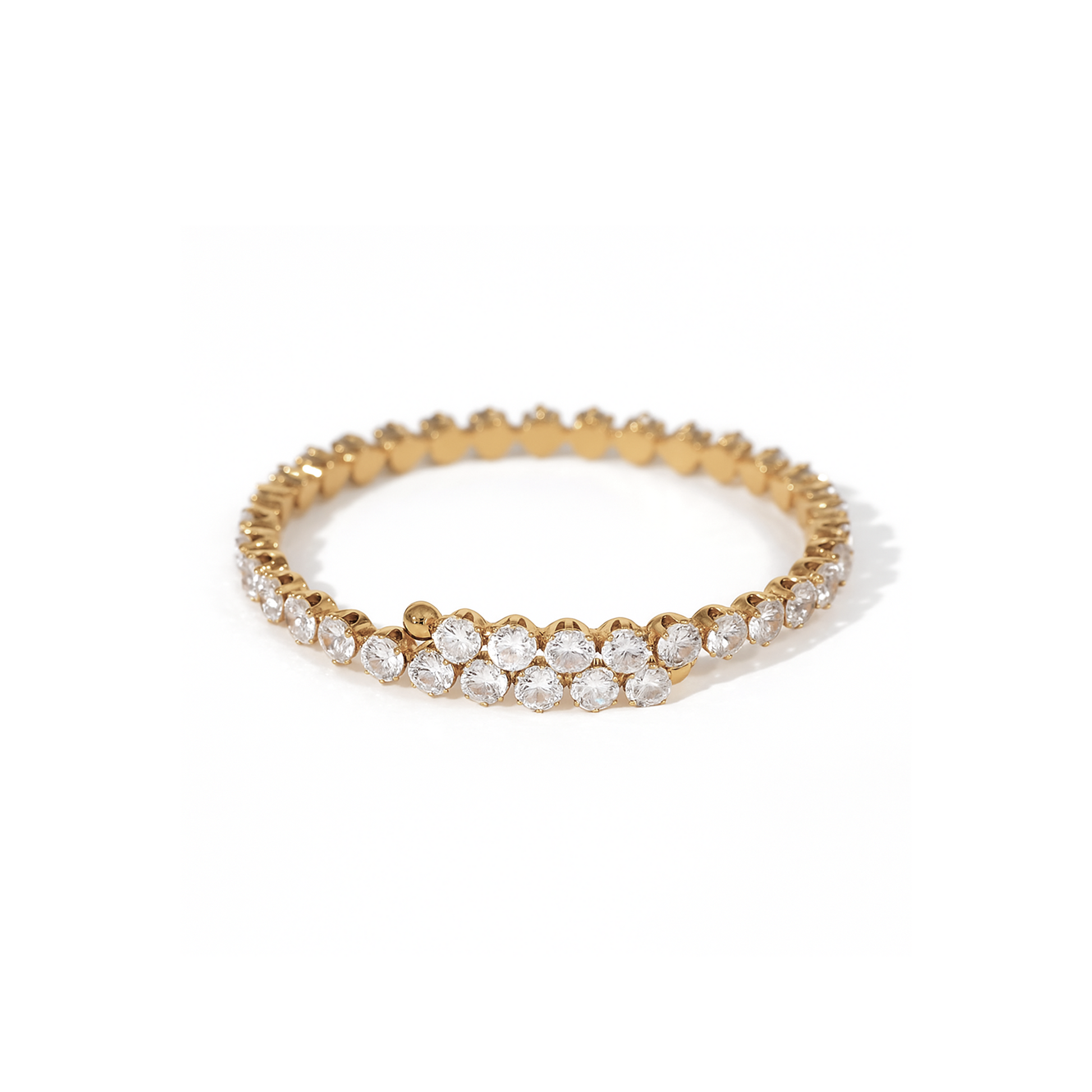 Gold bracelet with clear stones on a white background